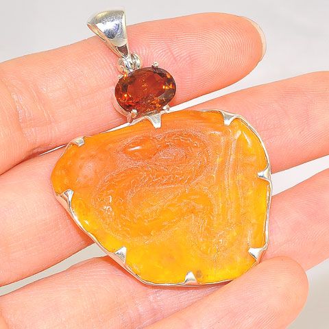 Sterling Silver 19.3-Carats Snake Carved Yellow Opal and 2.6-Carats Champagne Topaz Pendant