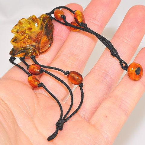 Black Thread Baltic Honey Amber Beaded and Baltic Honey Amber Carved Flower Bracelet