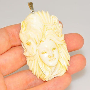 Sterling Silver Carved Bone Goddess and Rhino Pendant