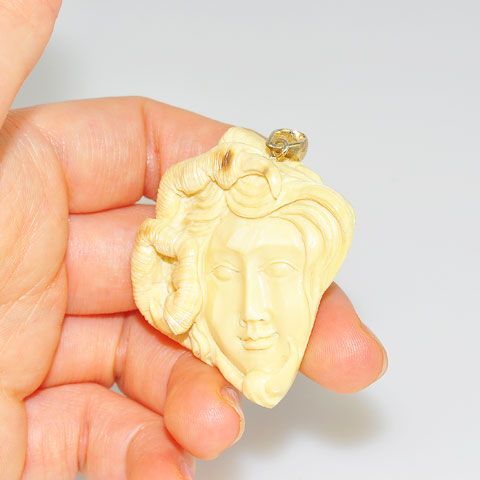 Sterling Silver Carved Mammoth Ivory Goddess Face and Talon Pendant