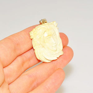 Sterling Silver Carved Mammoth Ivory Face Pendant