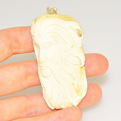 Sterling Silver Carved Moose Antler Feather God Pendant