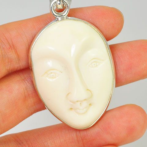 Charles Albert Sterling Silver Carved Bone Face Pendant