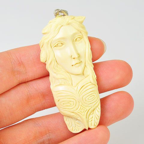 Sterling Silver Carved Fossilized Walrus Ivory Goddess and Bird Motif Pendant