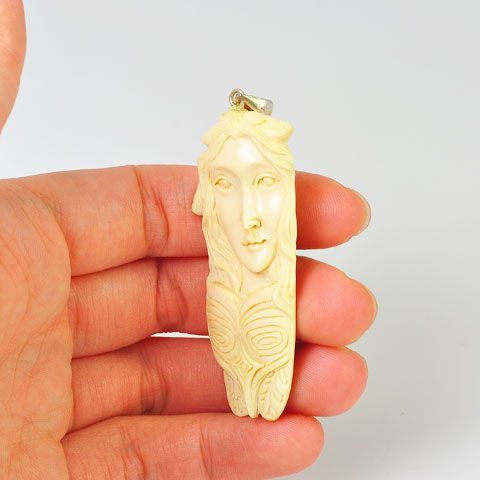 Sterling Silver Carved Fossilized Walrus Ivory Goddess and Bird Motif Pendant