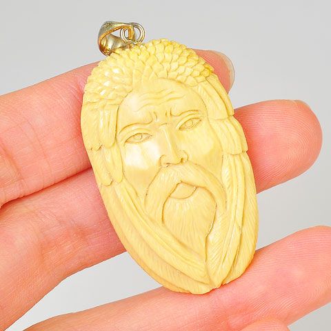 Sterling Silver Carved Mammoth Ivory God Pendant