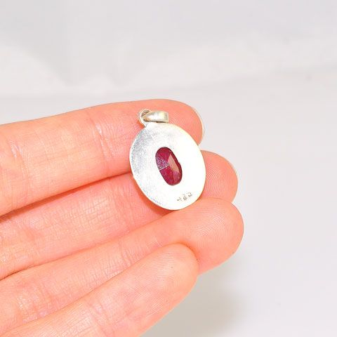 Sterling Silver Tibetan Faceted Ruby Oval Pendant