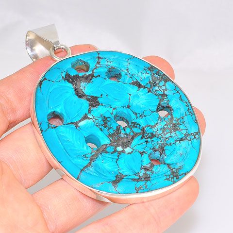 Sterling Silver Flower Carved and Punctured Turquoise Pendant