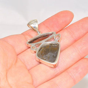 Sterling Silver Fossilized Dinosaur Bone with 4.8 Carats Smoky Quartz and 0.8 Carats White Topaz Pendant