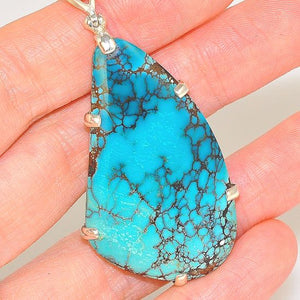 Sterling Silver 37.6 Carats Turquoise and 0.1 Carats White Topaz Pendant