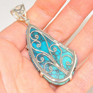 Sterling Silver 37.6 Carats Turquoise and 0.1 Carats White Topaz Pendant