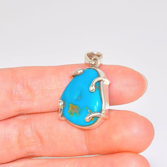 Sterling Silver Sleeping Beauty Turquoise Nugget Wire Held Pendant